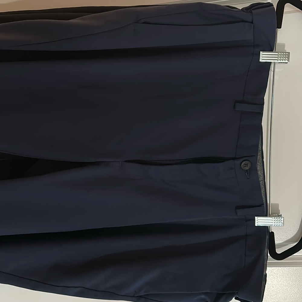 Haggar expandable waist ; Navy blue dress pants. 
42/32